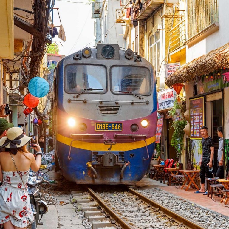Limousine, sleeping bus, train, flight tickets 31 reunification-express-train-street-hanoi